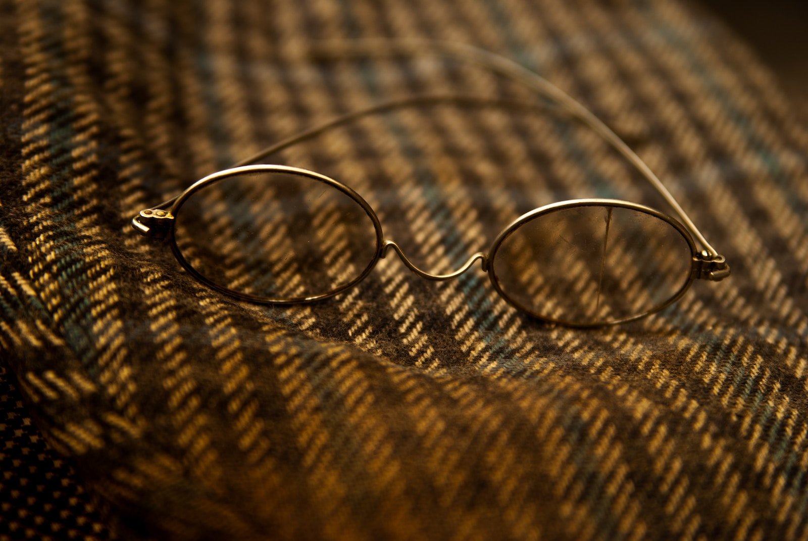 Silver ring on brown textile