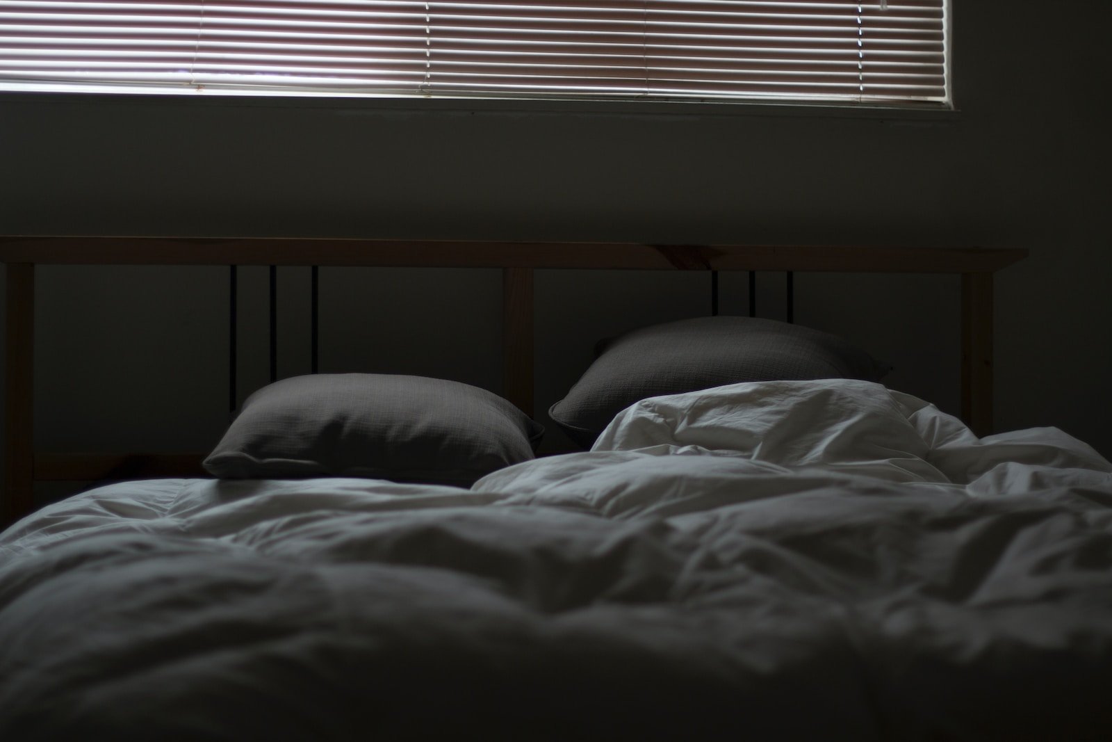 Empty white and gray bed set