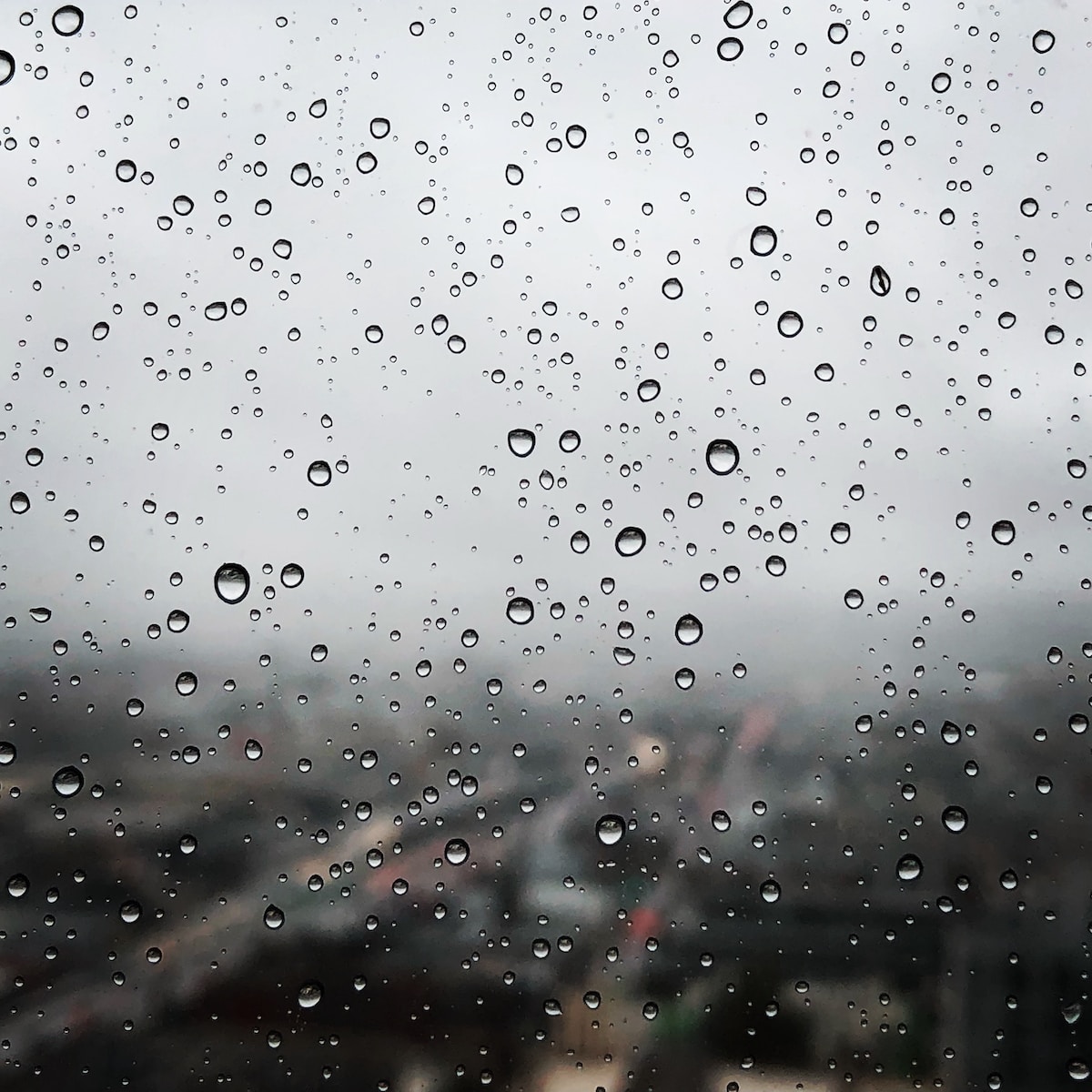 Raindrops on clear window