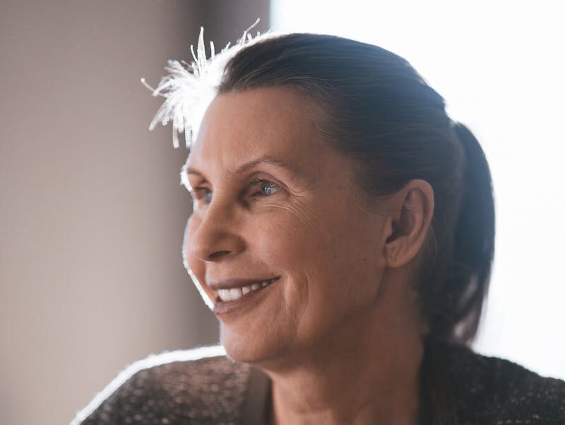 Close up shot of an elderly woman smiling