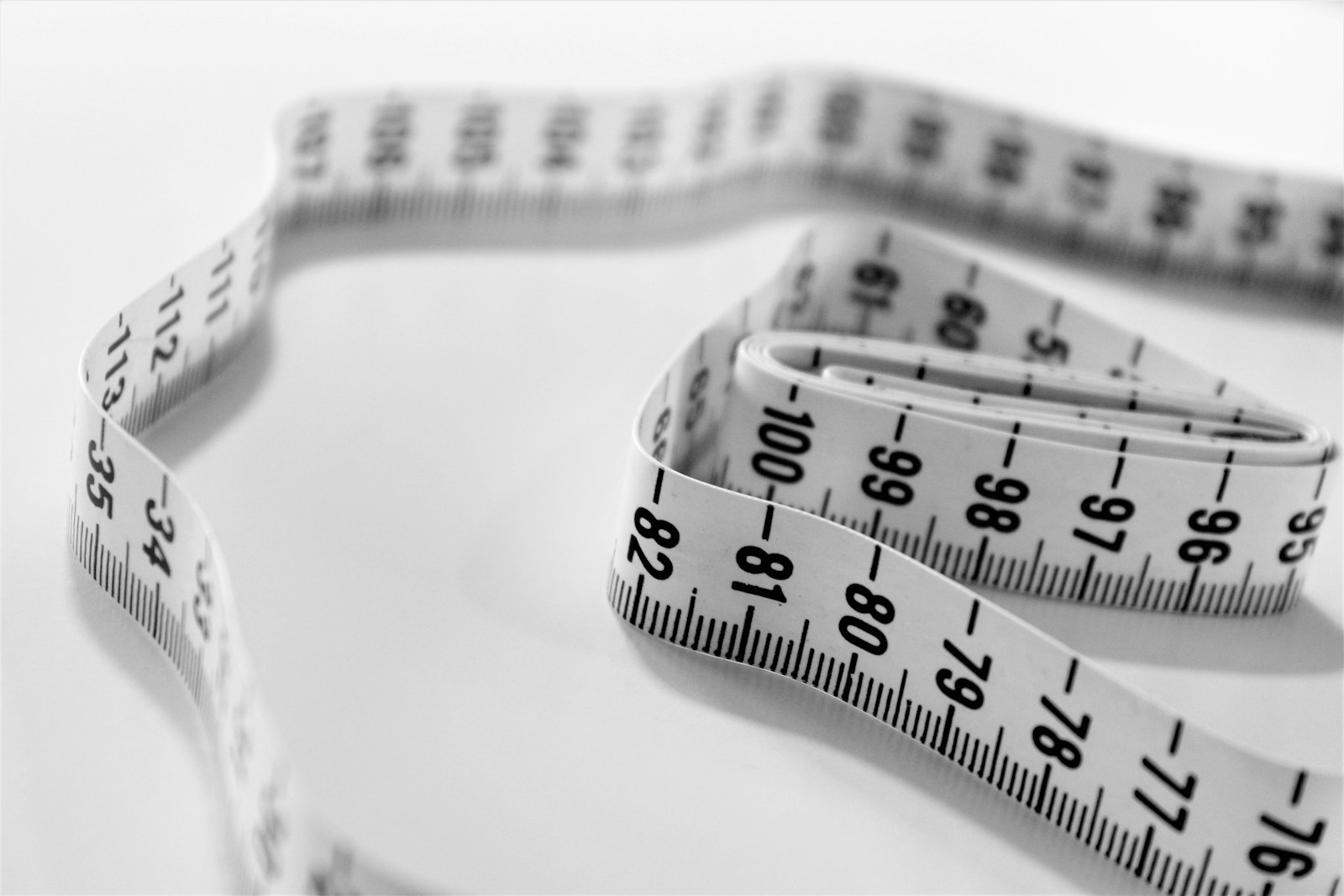 Selective focus photography of tape measure