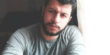 a man sitting in a chair