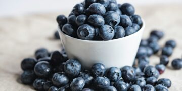 blueberries on white ceramic container