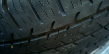 a close up of a tire on a vehicle