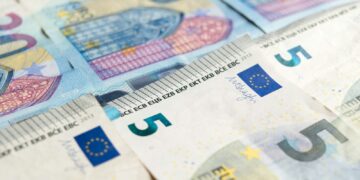 20 euro bill on white textile