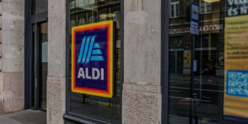 a store front with a large ad on it