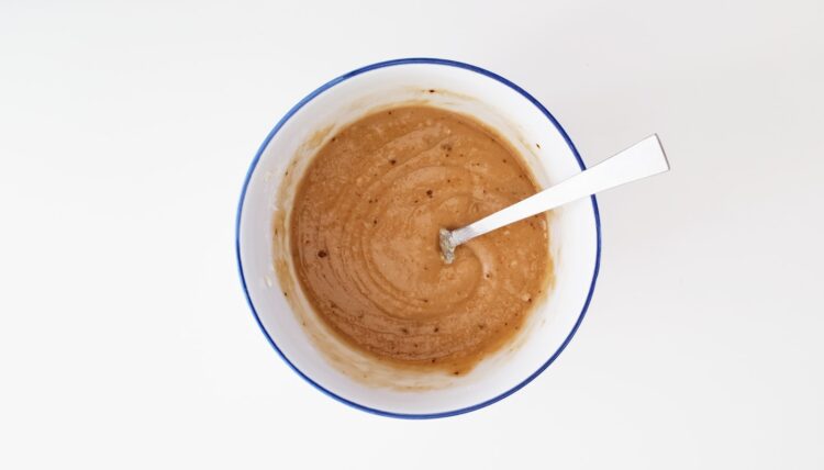 Brown beverage inside cup