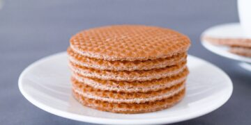brown round cookies on white ceramic plate