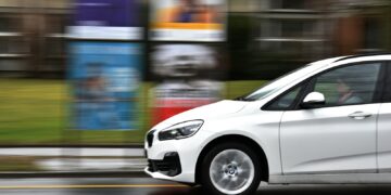 white car on road during daytime