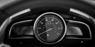 black and white car speedometer