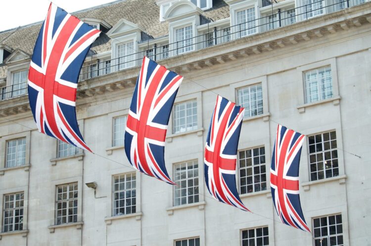 United kingdom flags hanged near building