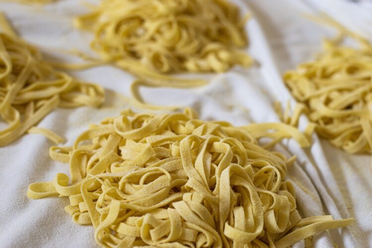 Tagliatelle pasta food fresh preparation drying yellow pasta noodles floor tagliatelle pasta pasta pasta pasta pasta noodles noodles