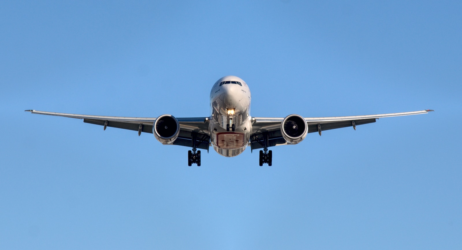 Airplane in midair at daytime