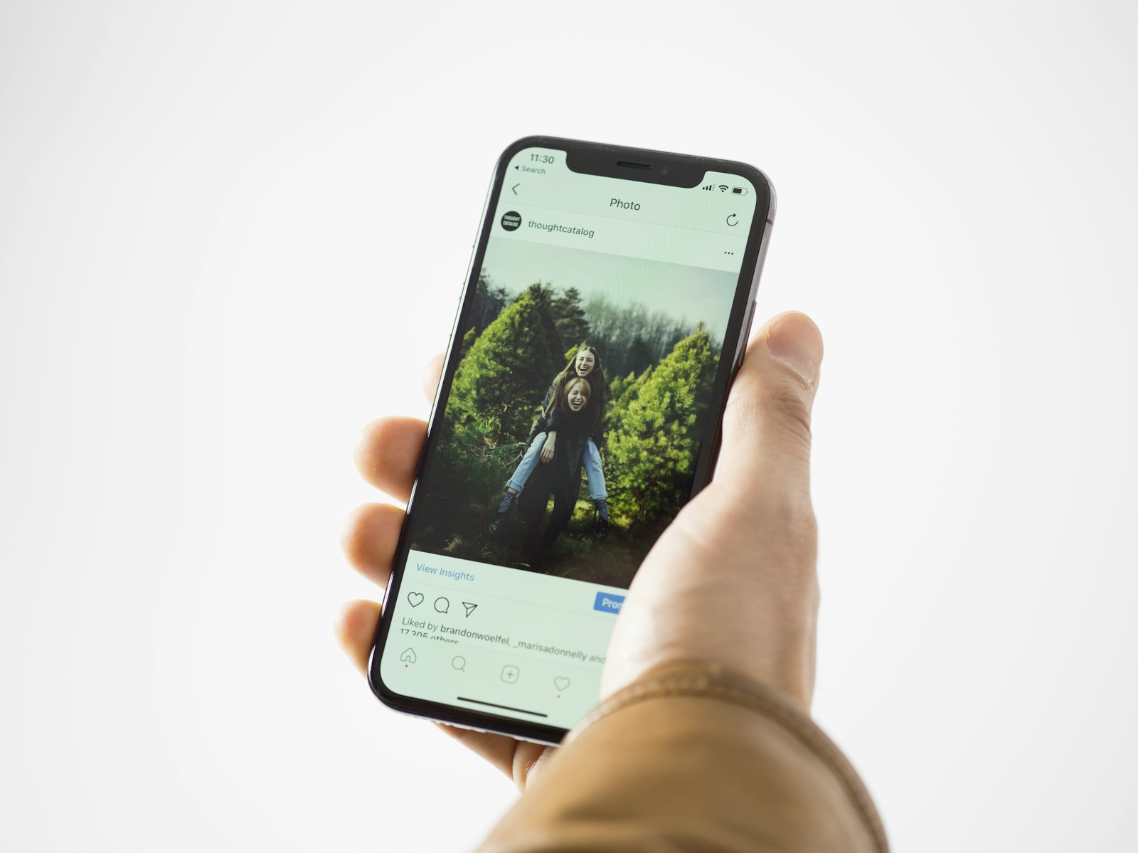 Person using black smartphone