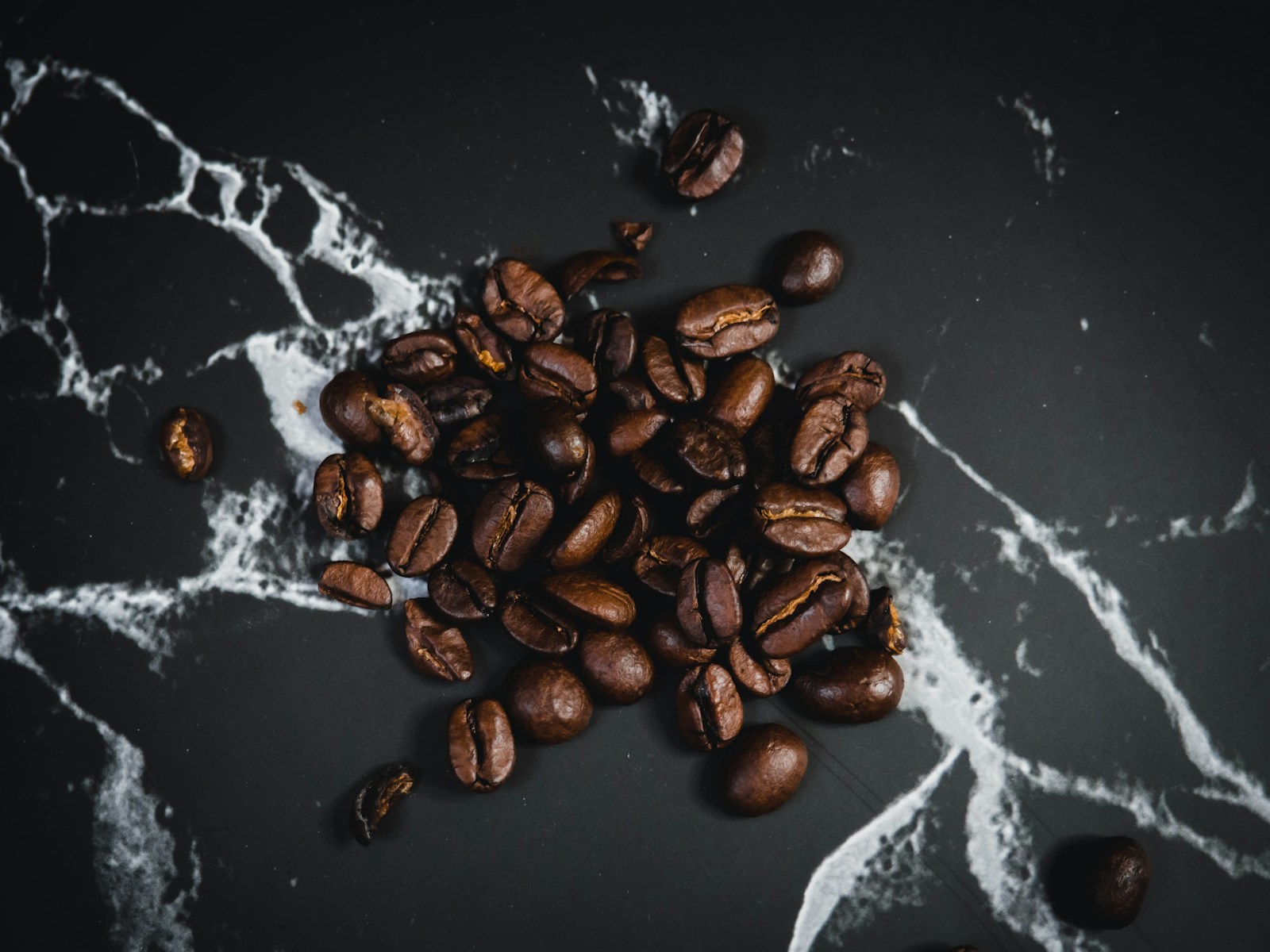 Brown coffee beans on water