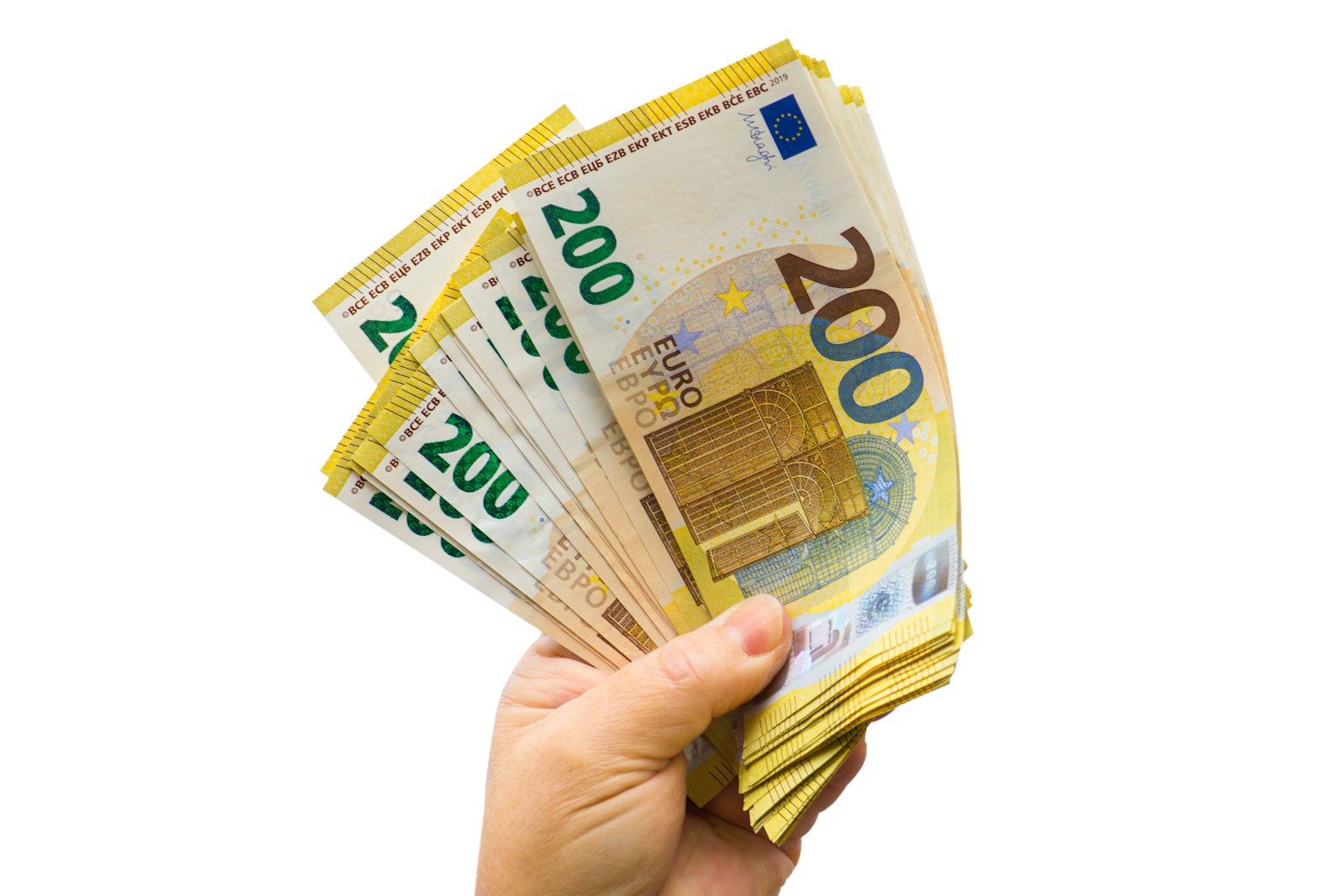 A person holding a bunch of money in their hand