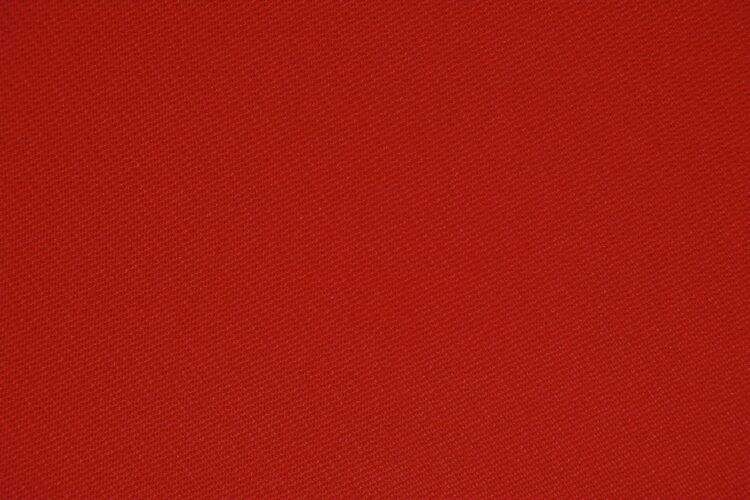 Red textile in close up photography
