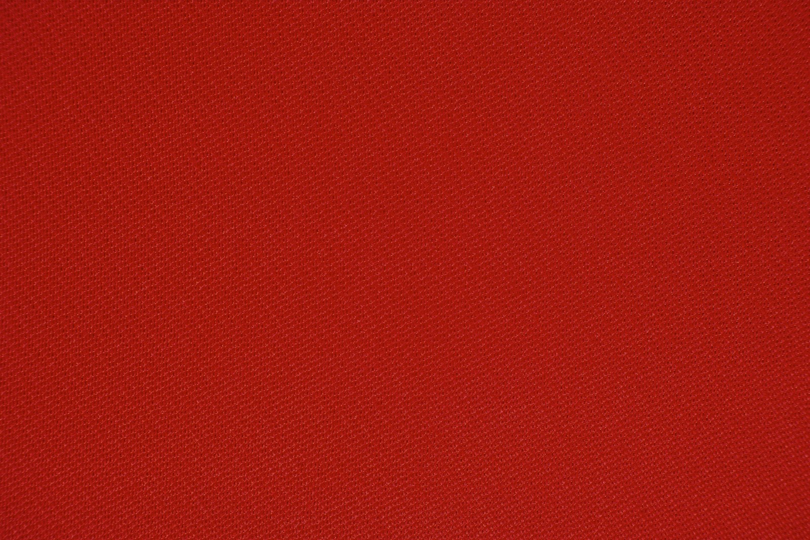 Red textile in close up photography