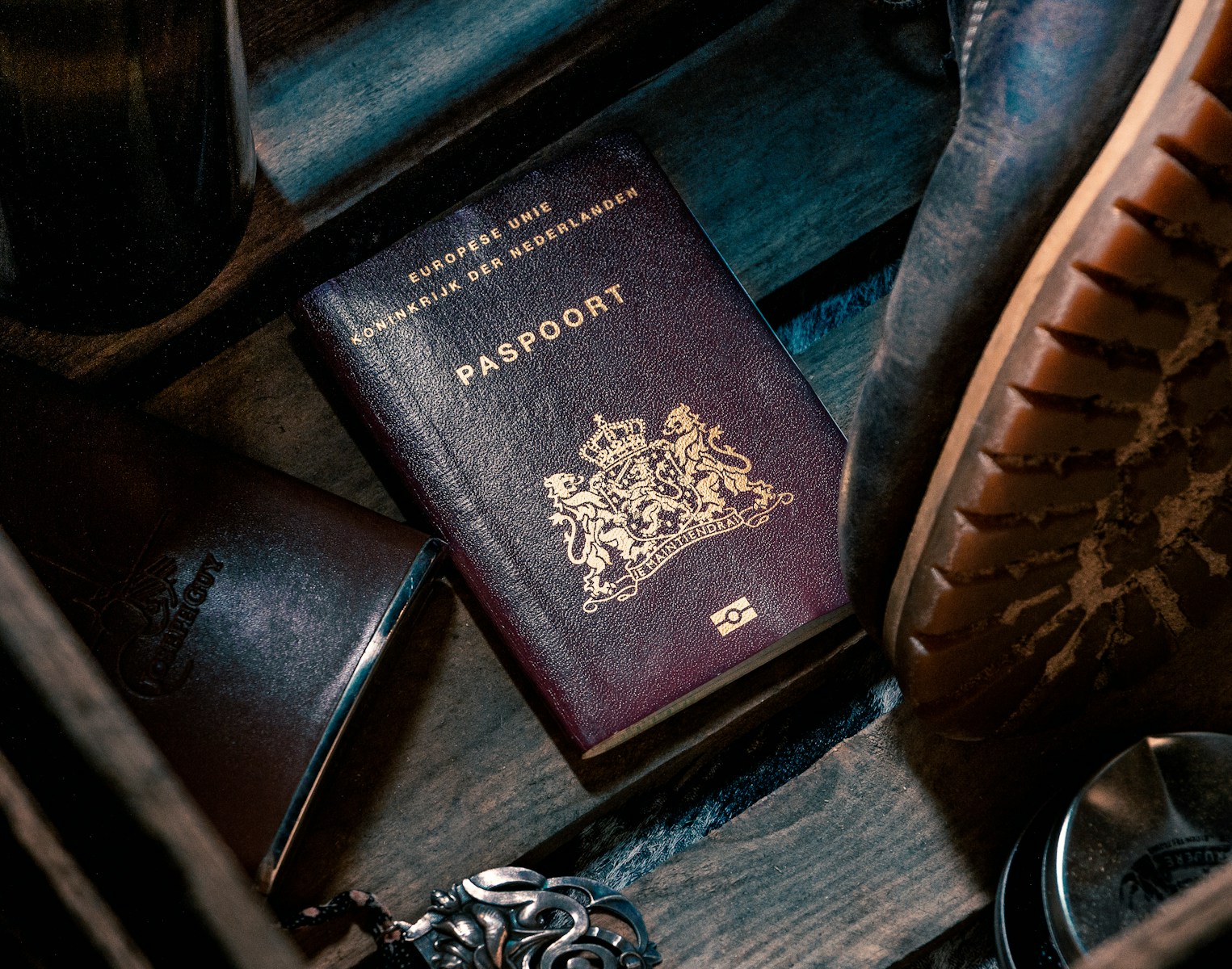 Black leather bifold wallet on black leather textile