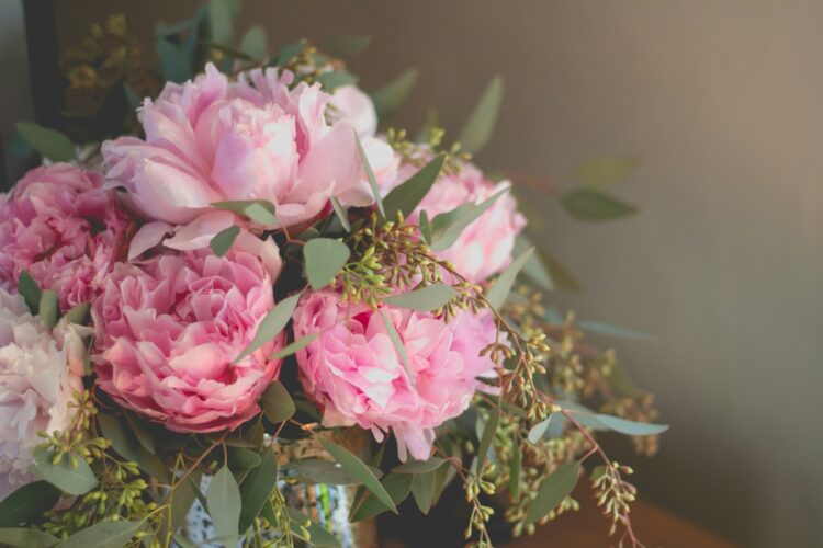Close up photo of pink petaled flowers bouquet