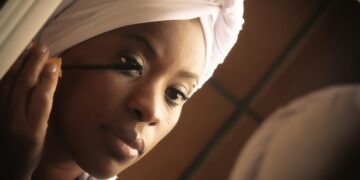 woman in white hijab smiling