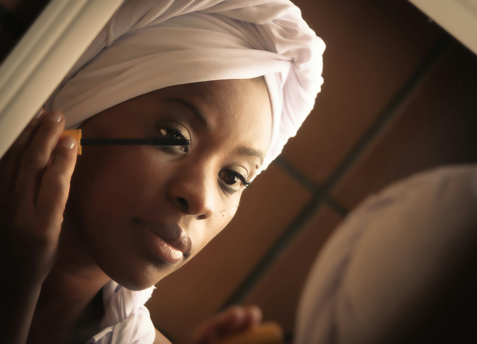 Woman in white hijab smiling