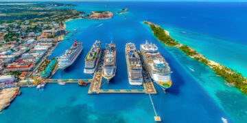 aerial photography of white and blue cruise ships during daytime