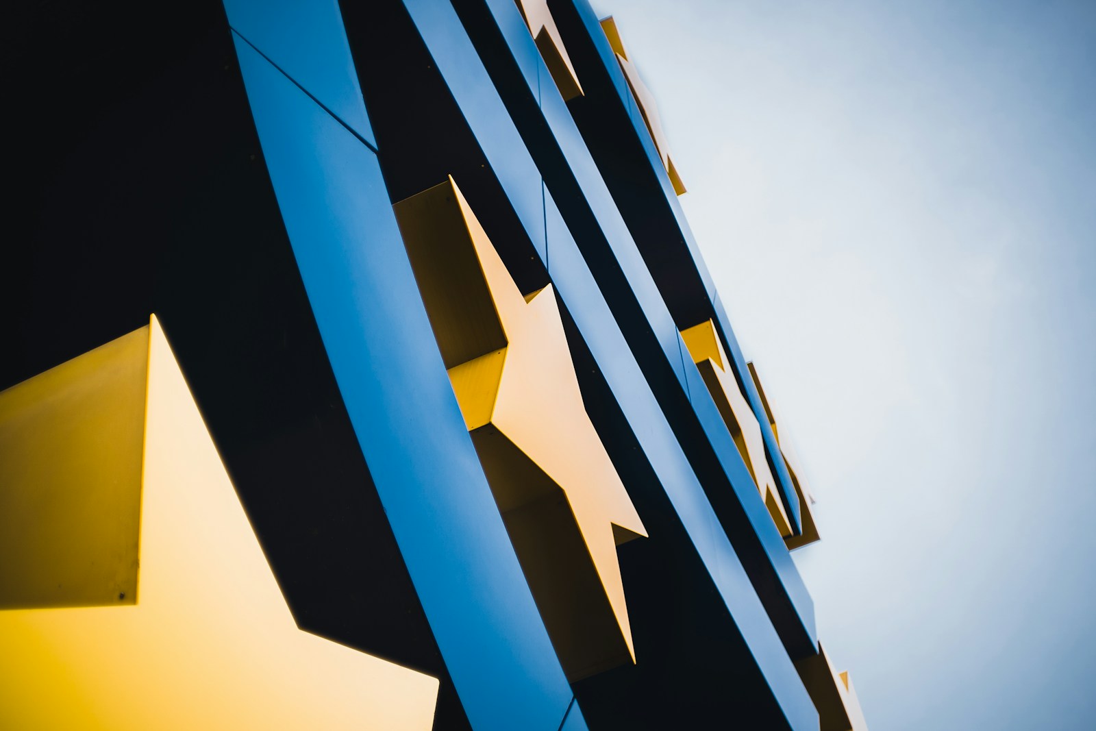 Blue and yellow building under blue sky during daytime