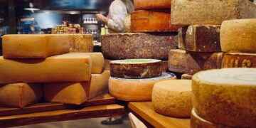 a bunch of cheese stacked on top of each other