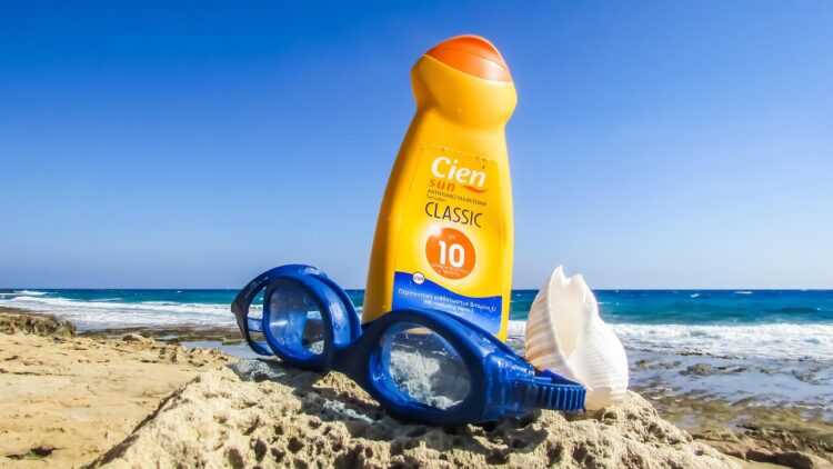 Summer nature vacations holidays sun lotion suncream goggles shell spectacles sun beach sunscreen cream blue sun