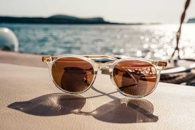 White framed brown lens sunglasses