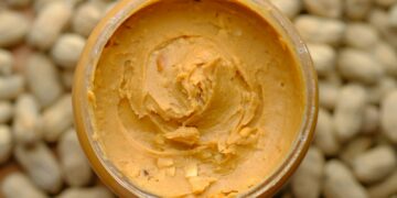 brown powder in brown round container