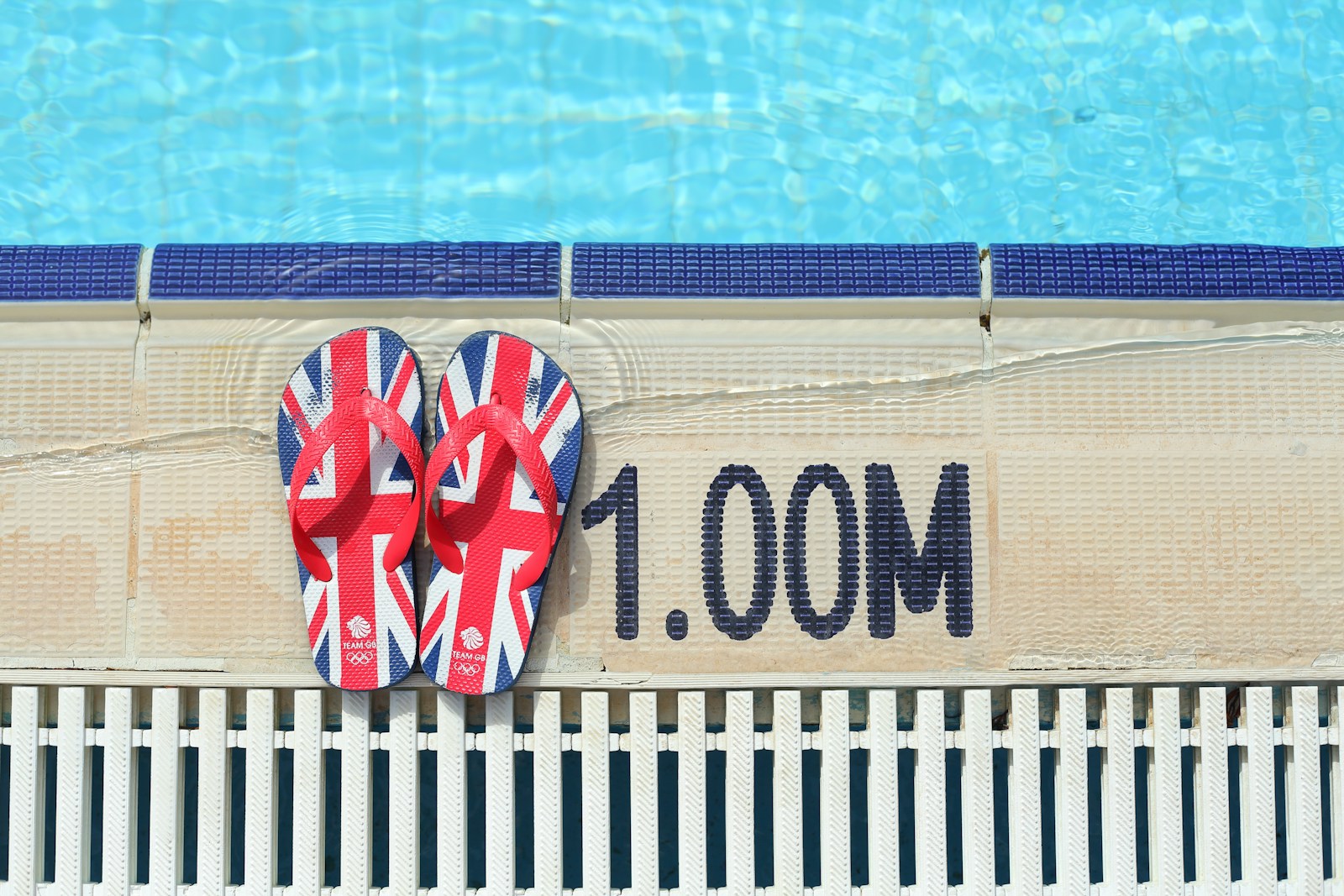 Pair of red blue and black union jack flip flops