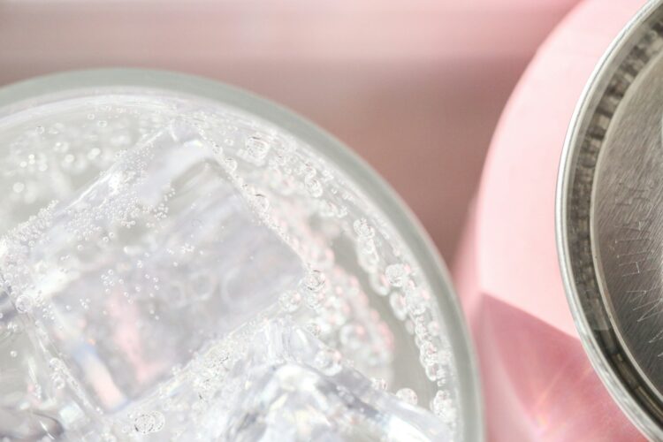 Clear plastic container with white powder