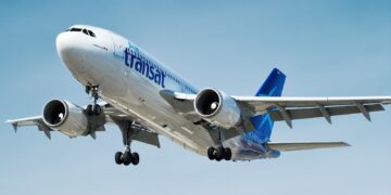 photo of gray and blue Transat airplane