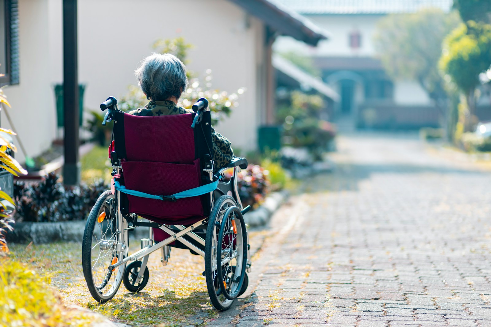 Woman sitting on wheelchair
