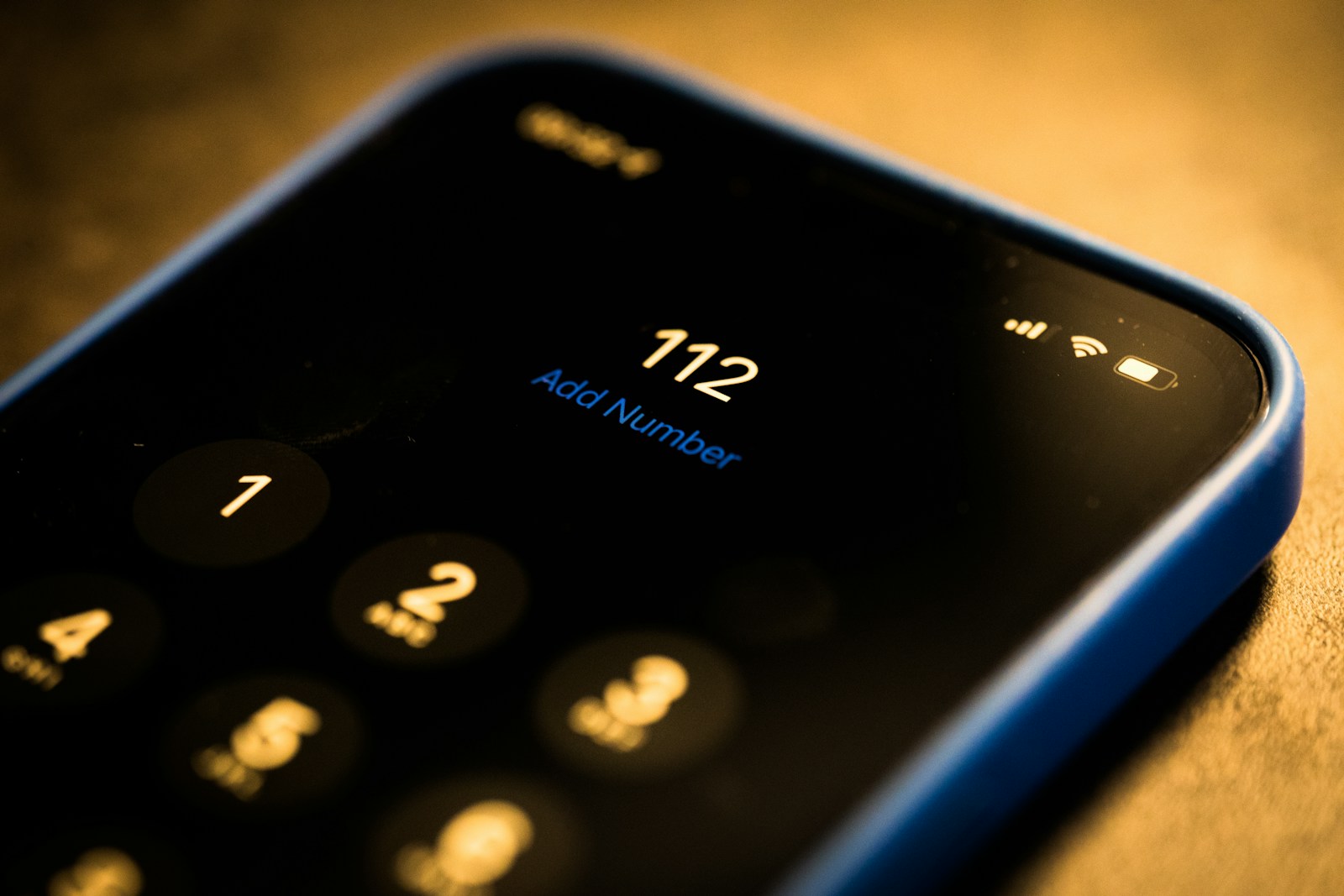 A close up of a cell phone on a table