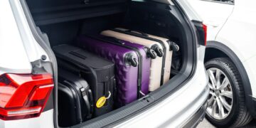a car with a suitcase in the trunk