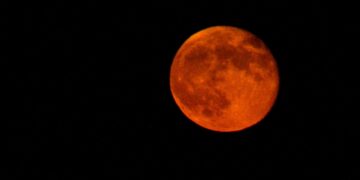 full moon in dark night sky