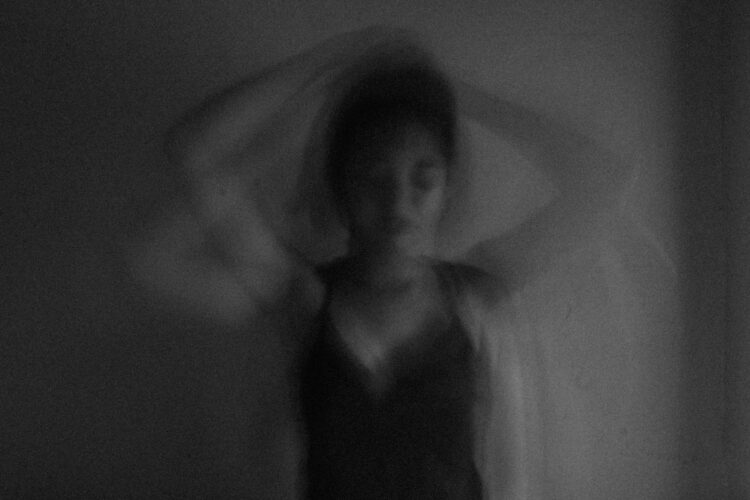 Woman in black tank top