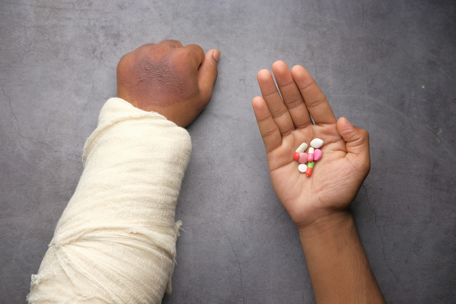 Person holding babys hand