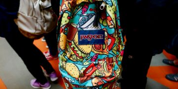 a group of people standing next to each other