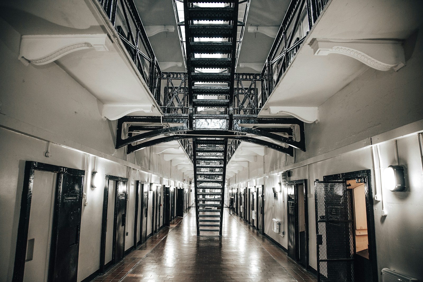 Empty hallway with turned on lights
