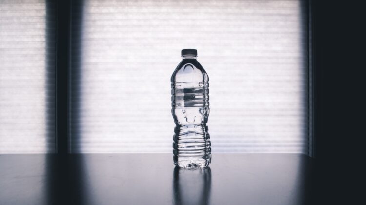 Clear drinking bottle filled with water