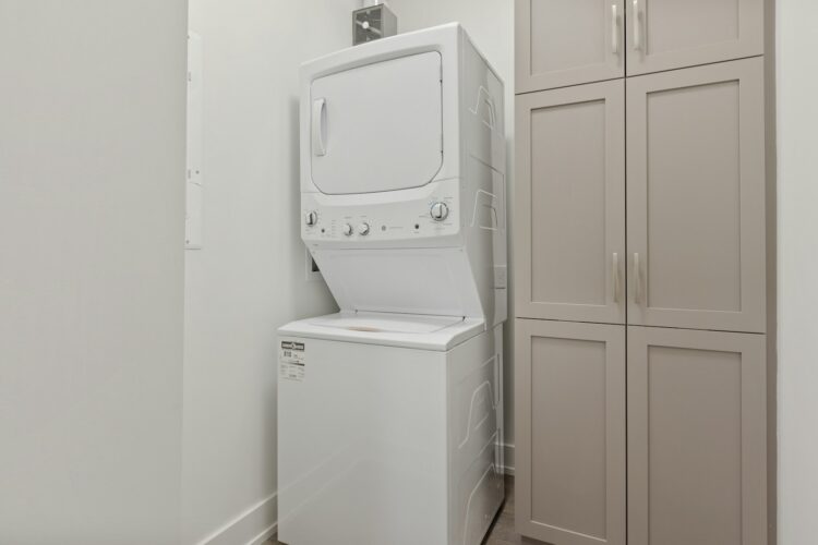 A washer and dryer in a small room