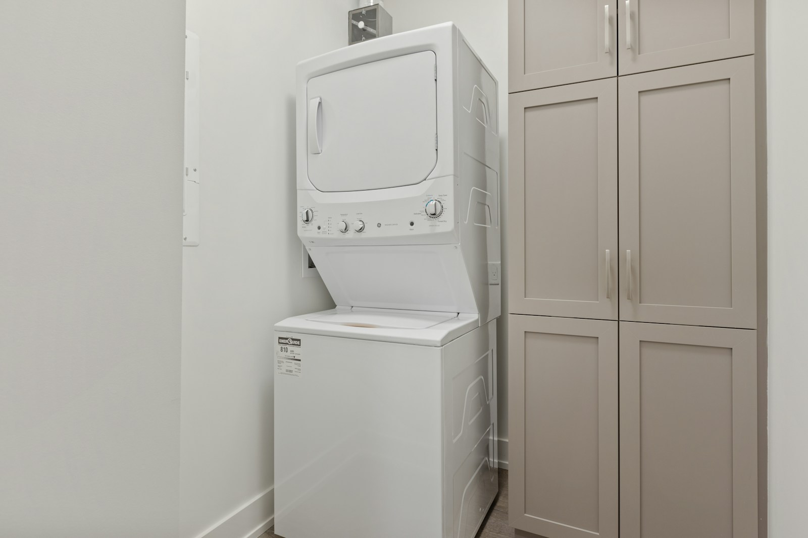 A washer and dryer in a small room