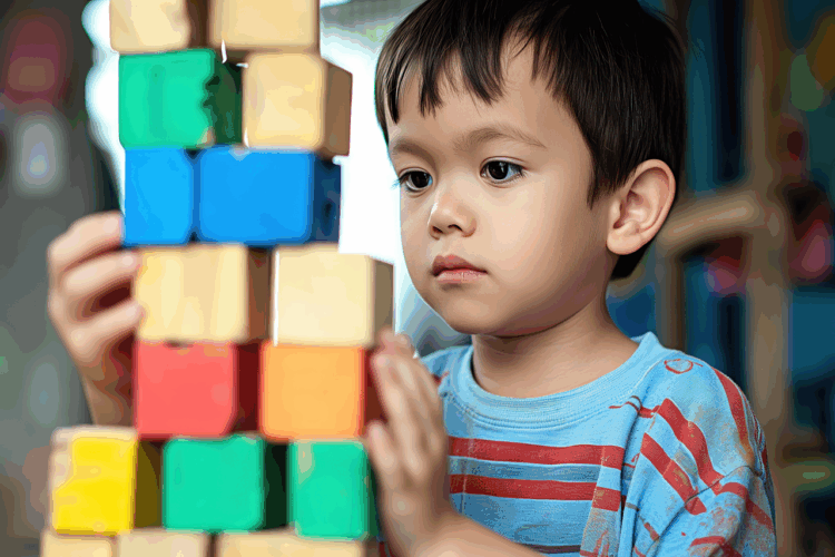 Ai generated young boy puzzle autism autism awareness building blocks colorful wooden blocks tower concentration indoor activity playtime hand eye coordination cognitive development focused educational toys learning preschooler enjoyment skill building patience preschool activity developmental toys balancing stripes montessori autism autism autism autism autism montessori