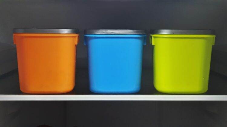 Orange blue and green plastic containers