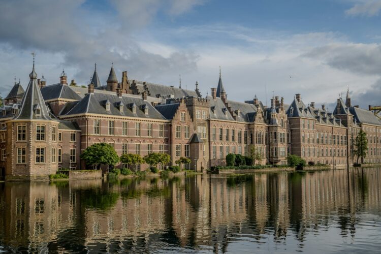 A large building sitting next to a body of water