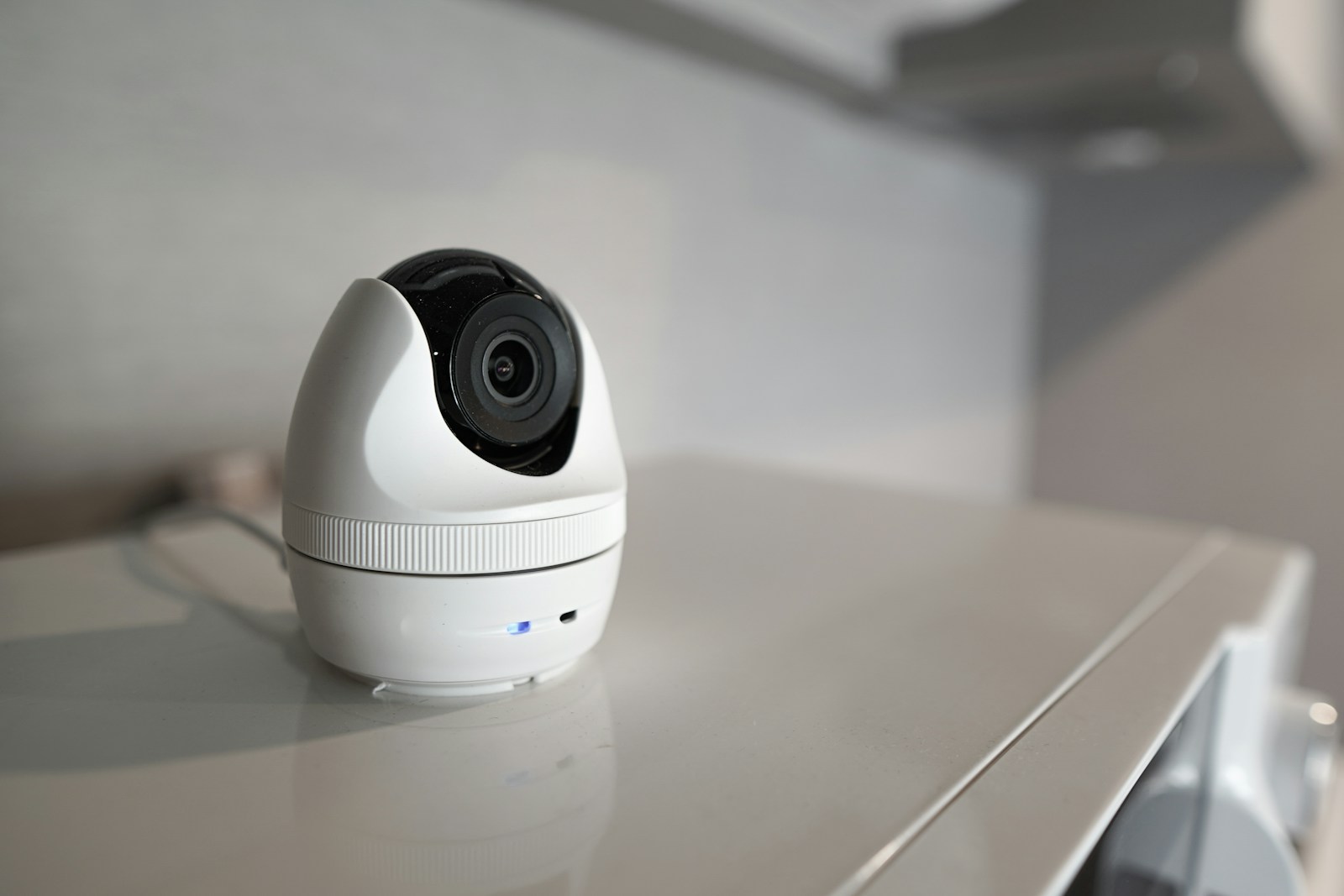 A white object with a black lens